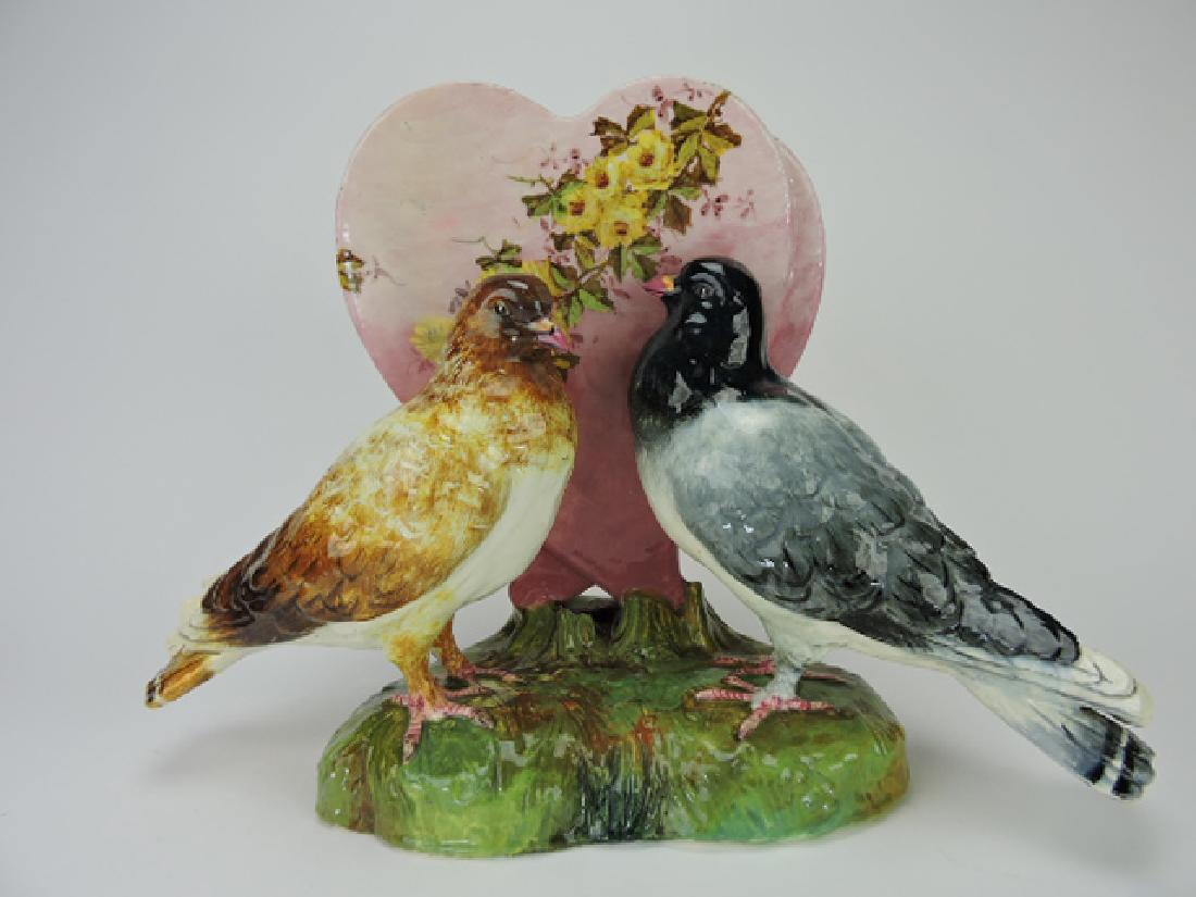 Jerome Massier majolica pair of love birds and: pink heart figural vase, 19"w, 13 1/2" h, professional repairs to high points