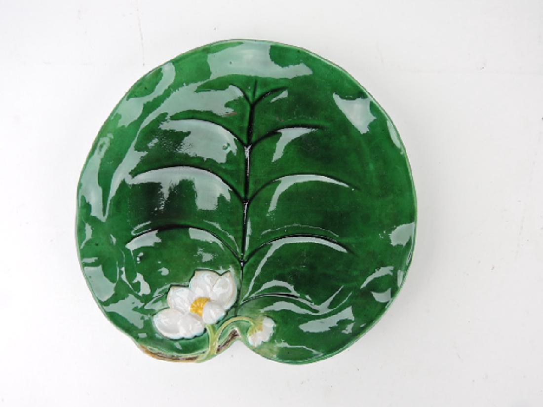 George Jones pond lily plate, rim repair: .