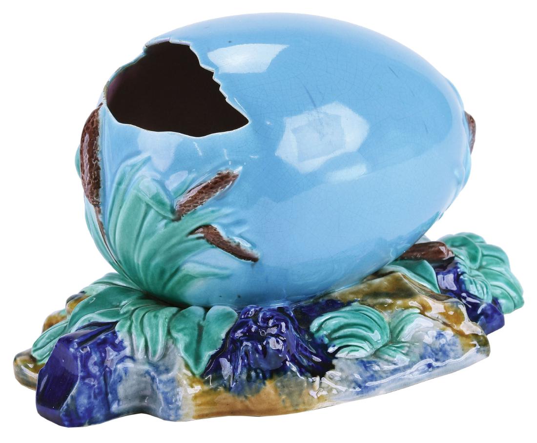 T.C. Brown Westhead Moore & Co Majolica Spoon: Warmer c.1875, modeled as a turquoise egg upon leaves and a rocky ground pedestal base, 8½"w, 5"h. Curated and catalogued by Nicolaus Boston