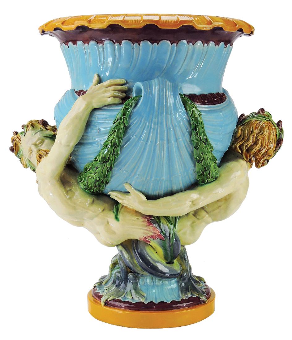 Large Minton Majolica "Marine"™ Wine Cooler c.1865,: Designed by Albert Carrier Bellouse, the turquoise campana shaped body modeled as shell, supported by two entwined bearded mermen, the tails forming the pedestal support, all upon a circular pedestal