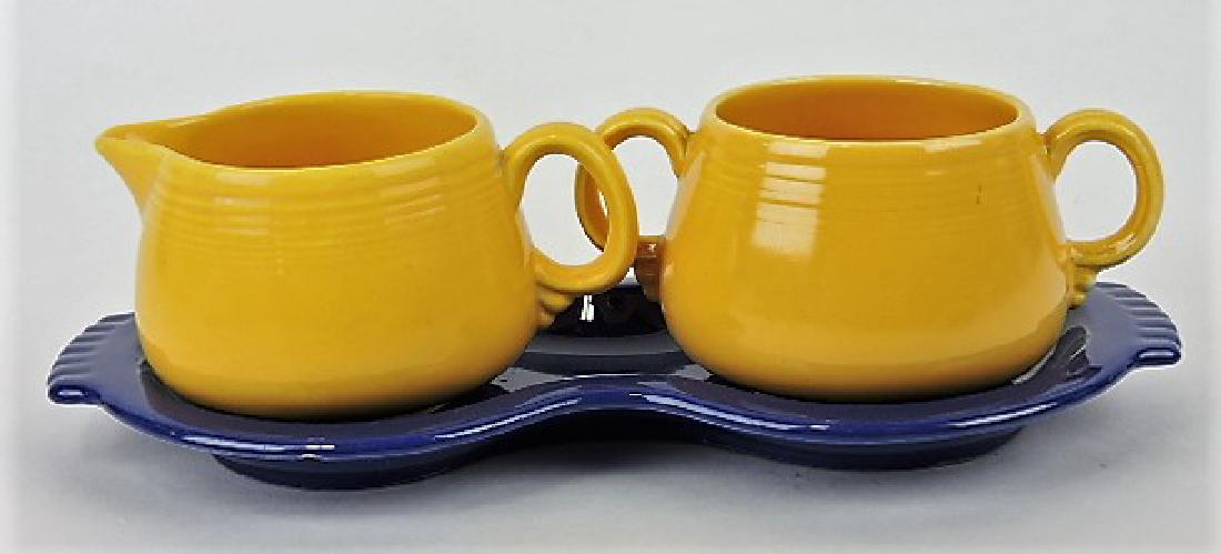 Fiesta individual cream & sugar set with: yellow cream & sugar (no lid) and cobalt figure 8 tray, chips to back