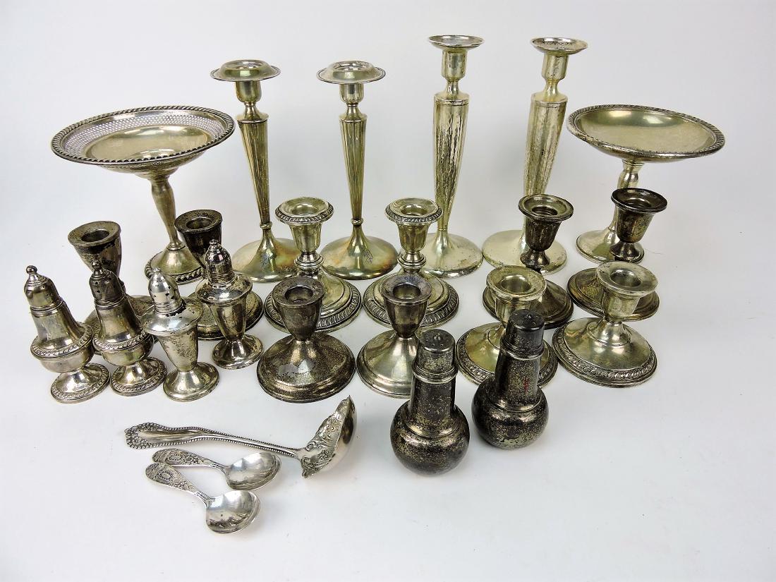Sterling silver lot of weighted: pieces, 2 compotes, 2 pair tall candle sticks, 5 pair short candle sticks & 2 pair salt/pepper AND silver plate pair of salt & pepper & 3 spoons