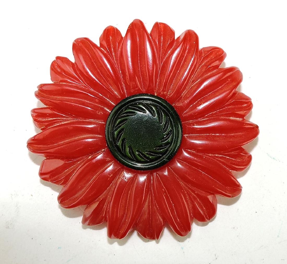 Bakelite flower form brooch,: 2 3/4"d
