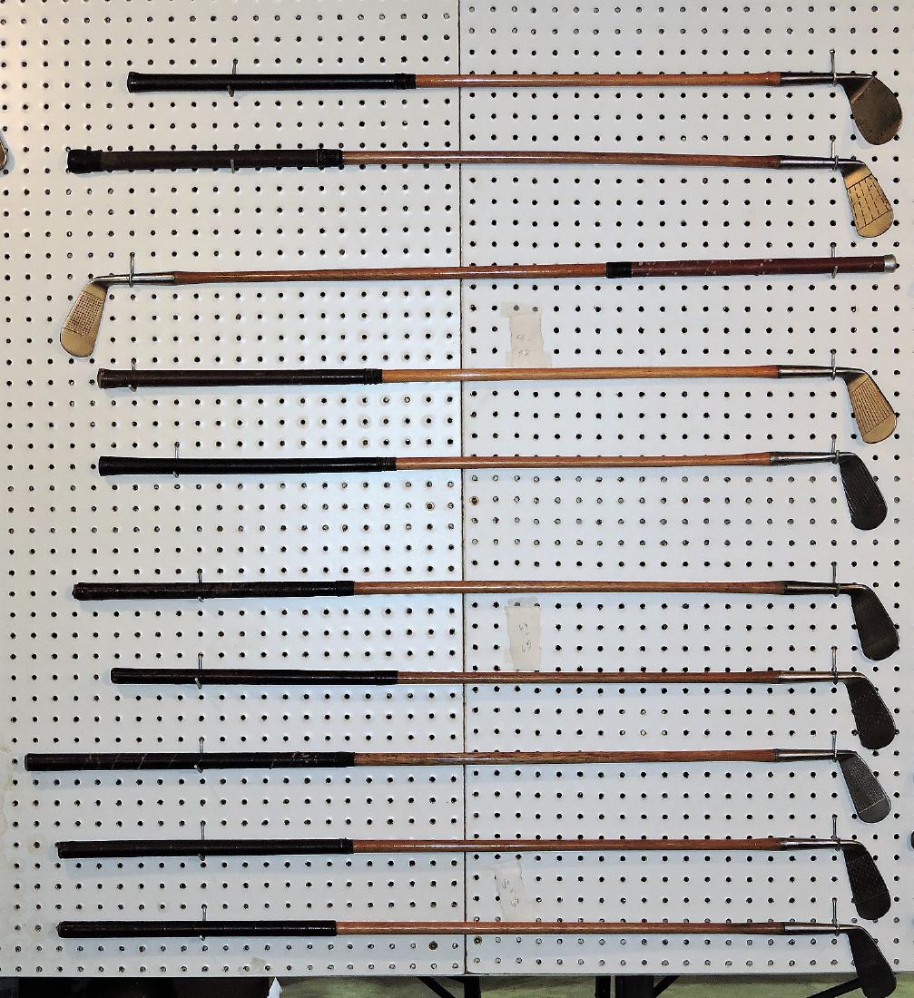 Wooden shaft golf club lot of 10 clubs;: Leader Rustless hand forged, Wm. Burke Co. Mashie; Chrome plate Pro-Made; Leader Rustless hand forged, Wm. Burke Co. Niblick; Thistle Mashie; Hand forged Ells Milwaukee ARISTOCort; MacGregor Mashie 5;