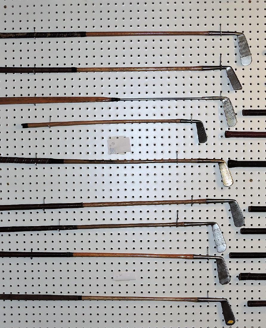 Wooden shaft golf club lot of 9:: Zimbo Mark putter; W.E. Harness; Hagen Gelaway putter; Robroy putter; MacGregor; Invincible putter; Diamond MFG Co putter; Chambion putter; Leader Rustless putter