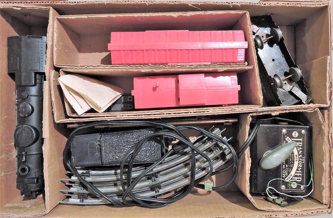 Louis Marx Steam Line electric: train set in original box with #666 engine, 2 tender, box car, transformer and track, tunnel, tower light, track accessories, and American Flyer #302 engine and tender