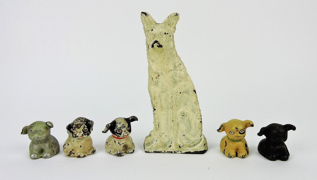Hubley lot of 5 cast iron pup: paperweights and dog doorstop