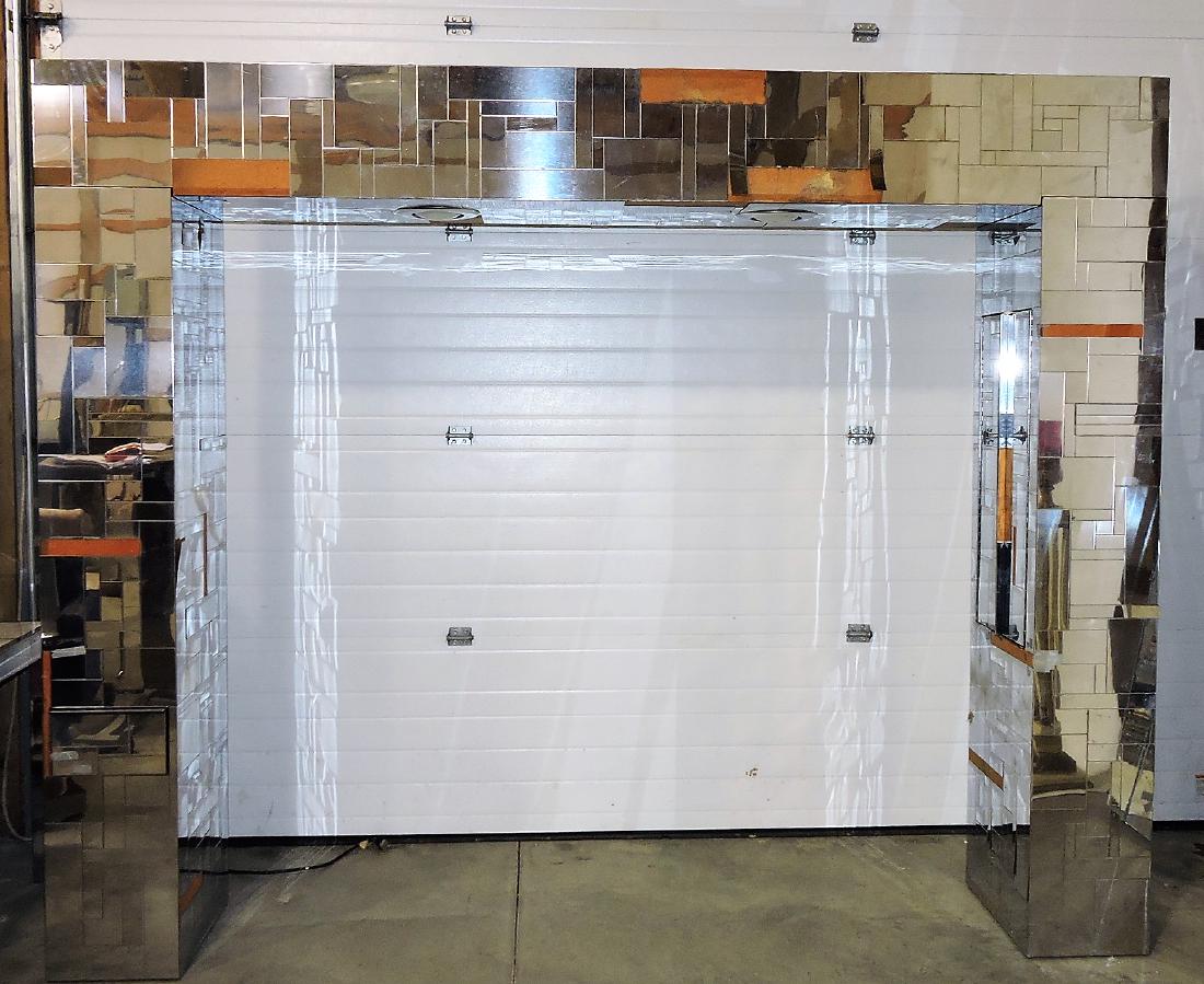 Paul Evans cityscape bridge: (signed), 84"h, 104"w, each post has pair of doors and a drawer for storage, lighted top, missing and bent chrome pieces, some loose pieces are included
