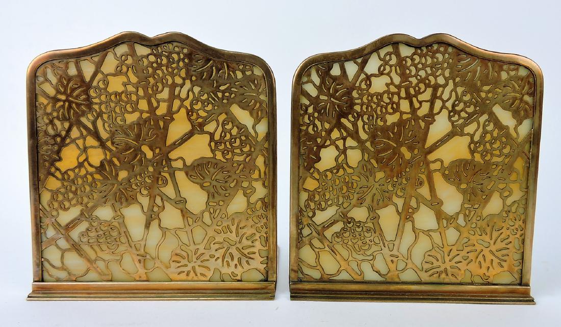 Tiffany Studios New York pair of: bronze bookends with caramel slag glass inserts, #1024
