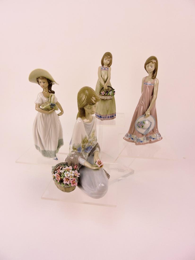 Lladro lot of 4 figures; "Woman with (1 of 1)
