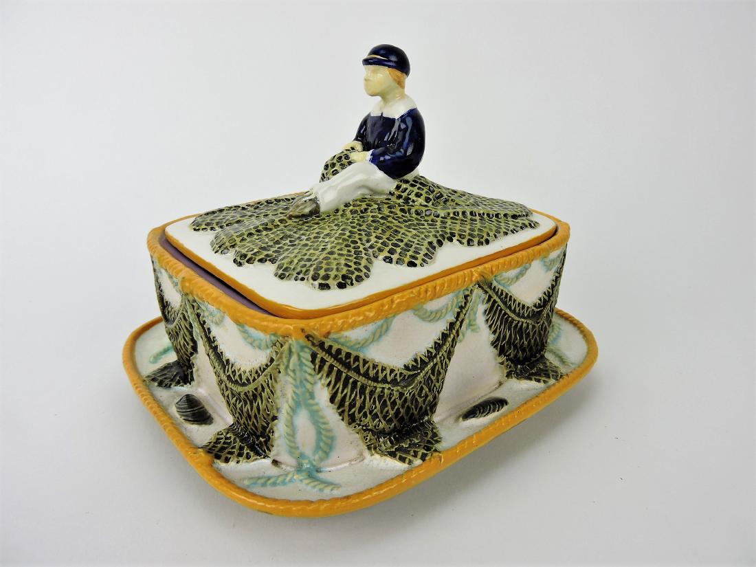 George Jones Majolica sardine box: with fisherman on lid, lid replaced