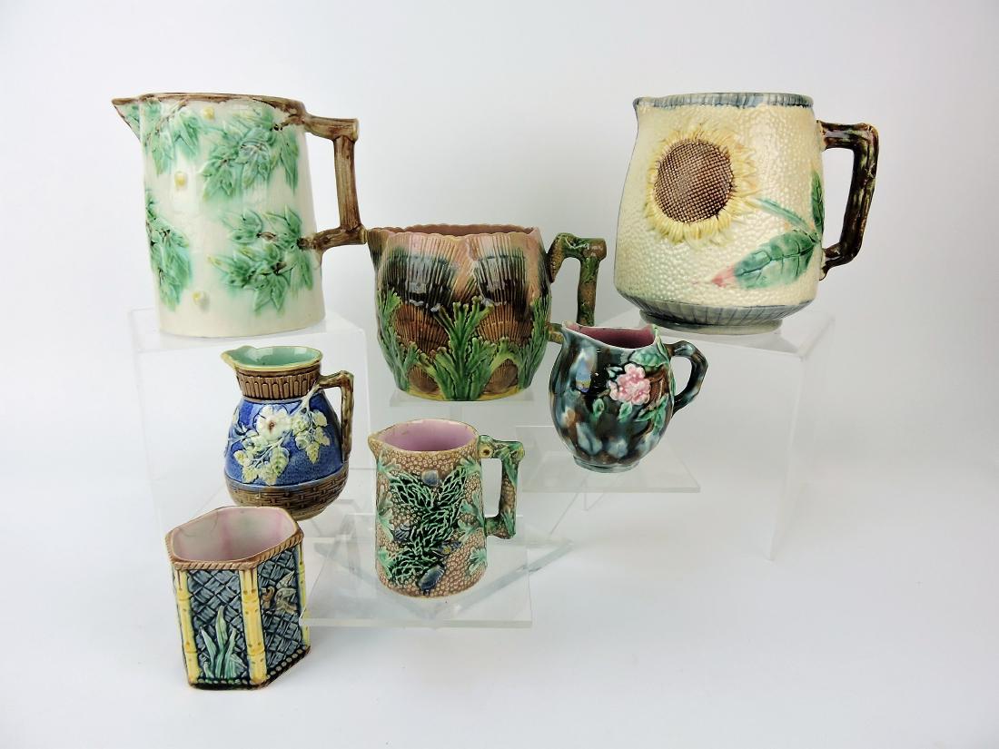 Etruscan Majolica lot of 6 pitchers: and one spooner, various condition