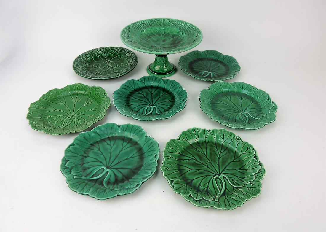 Majolica dark green lot of 7 plates: and compote, various condition