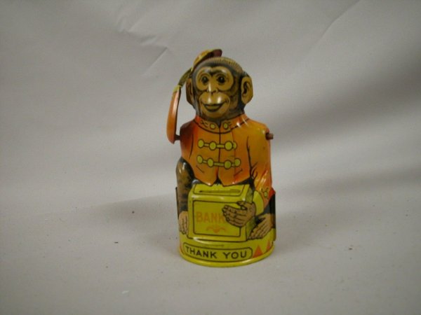 J. Chein monkey with hat tin organ grinder bank,