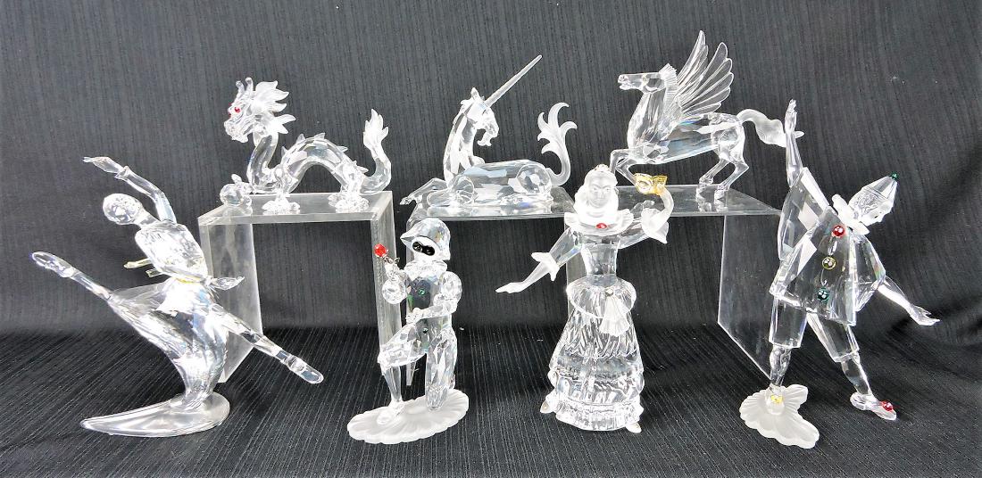 Swarovski lot of 7 society pieces;: 1997 The Dragon, 2001 Masquerade Harlequin, 2000 Masquerade Columbine, 1999 Peirrot, 1996 The Unicorn, 2004 Anna, 1998 Pegasus