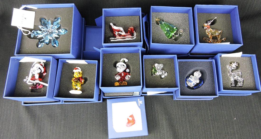 Swarovski lot of 11 Christmas: ornaments; Mickey, Minnie, Winnie the Pooh, sleigh, and others
