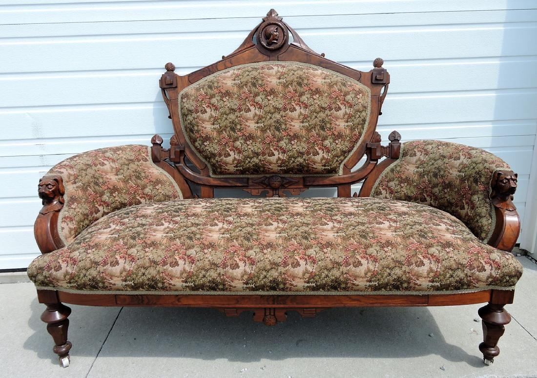 Walnut Victorian parlor sofa with carved (1 of 4)