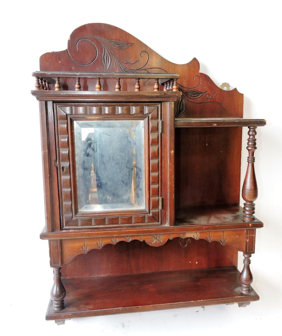 Walnut spoon carved wall cabinet: with beveled glass door, 29"h, 20"w