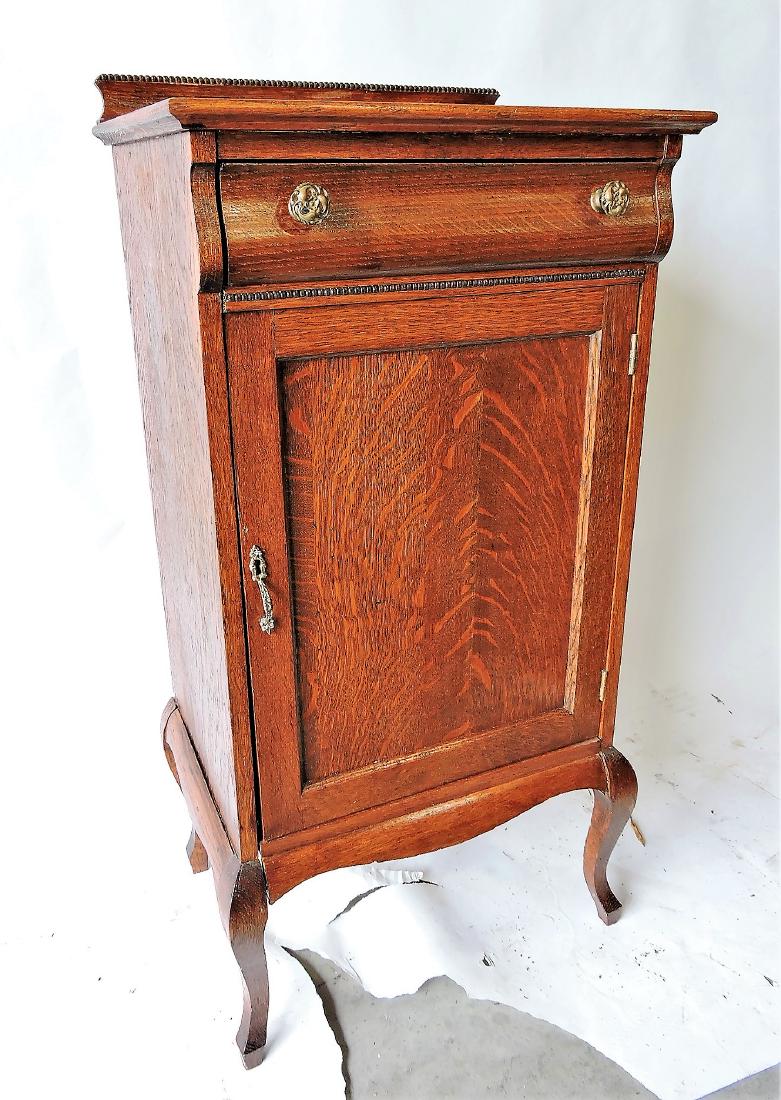 Oak music cabinet with drawer (1 of 3)