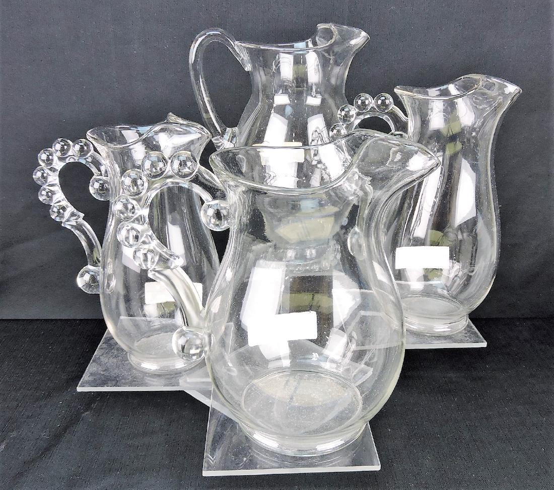 Imperial Candlewick lot of 4 pitchers,