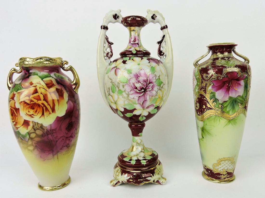 Nippon lot of 3 vases; 10" with roses,: 13 1/2" with seahorse handles (unmarked), 10 3/4" floral (base nick)