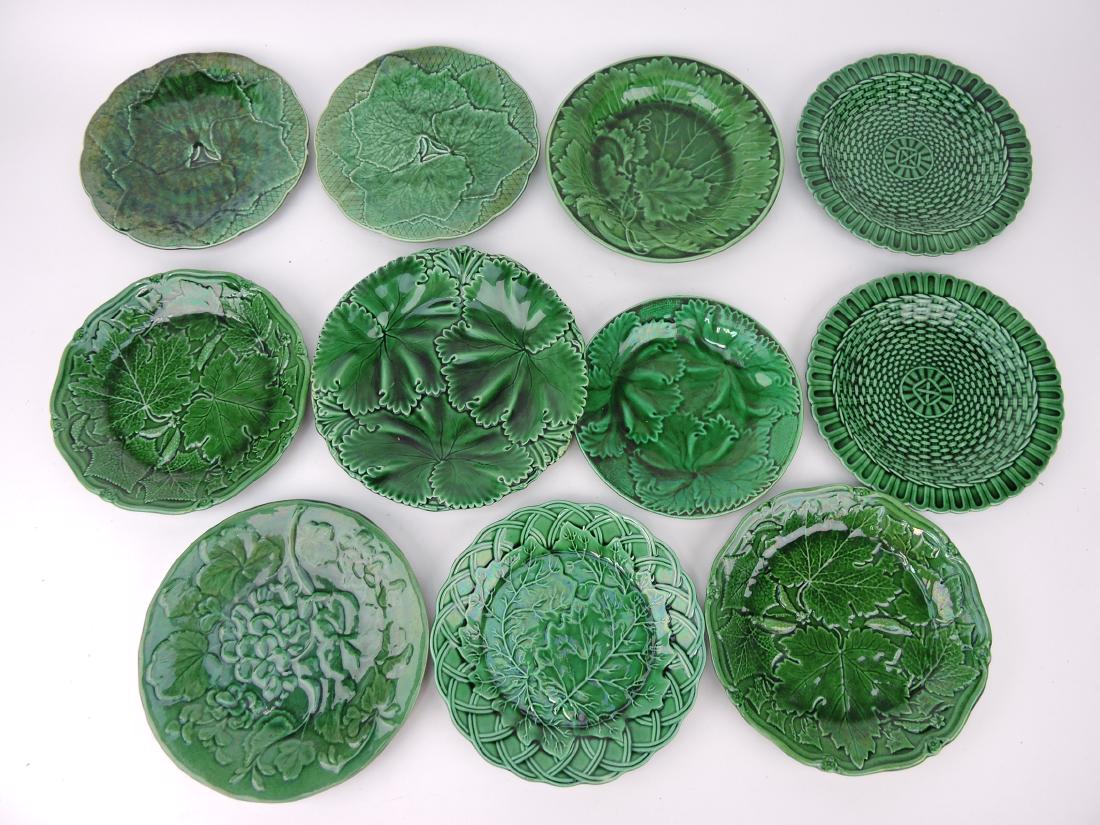 Majolica dark green lot of 11 plates: .