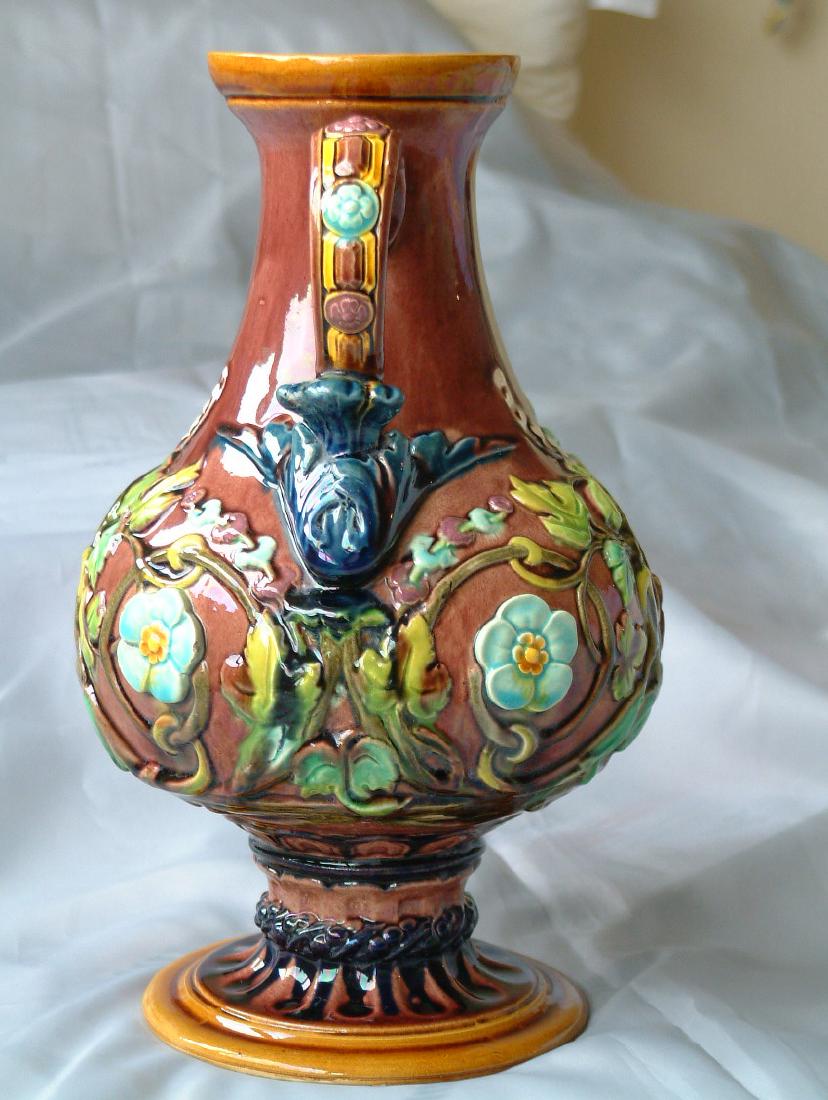 Large majolica face pitcher with: flowers and foliage, great detail, 10 1/2"