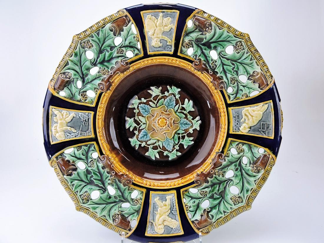 Rorstrand majolica Christmas platter: with holly berries and putti, 15 1/2"