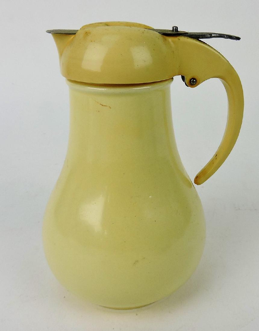 Fiesta syrup pitcher, ivory (1 of 1)