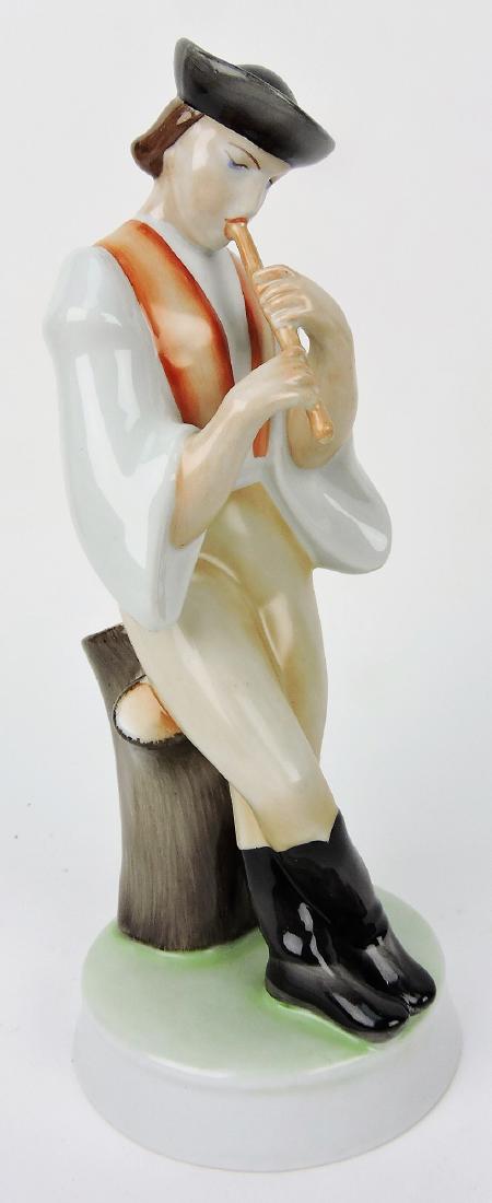 Zsolnay figure of man playing flute,: 10 1/2"