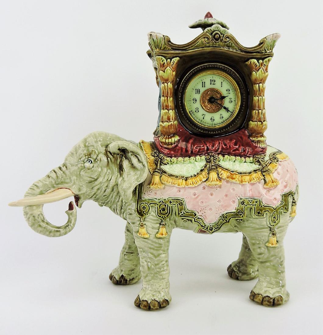 Julius Dressler majolica rare: elephant figural clock with Ansonia clock works (runs), 11", professional repair to elephant tusks