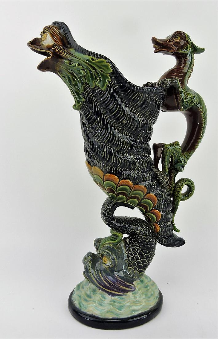Gerbing and Stephan majolica figural: pitcher with cornucopia supported by dolphin, griffen spout, and dragon handle, 14"