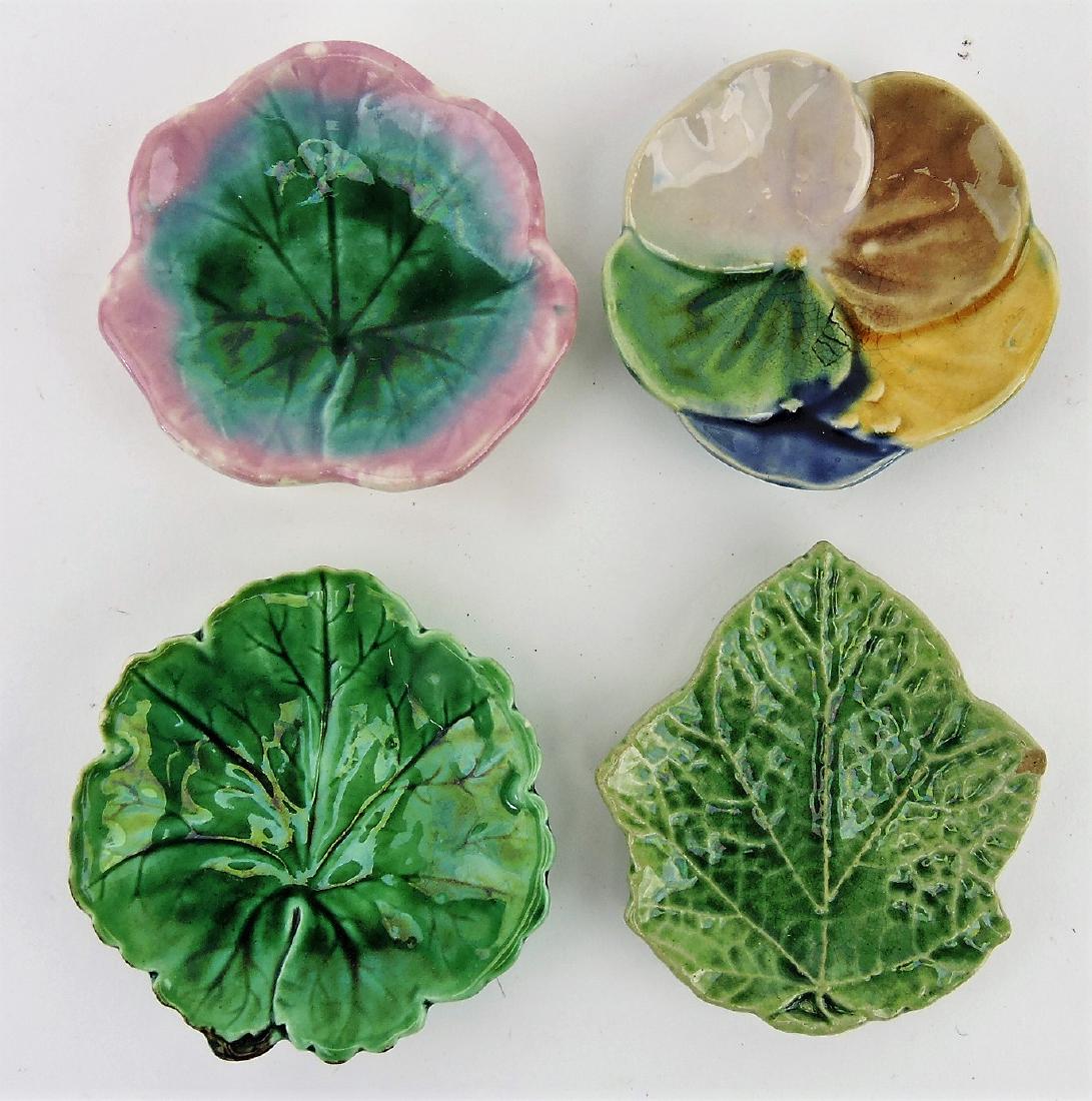 Majolica lot of 4 butter pats: .