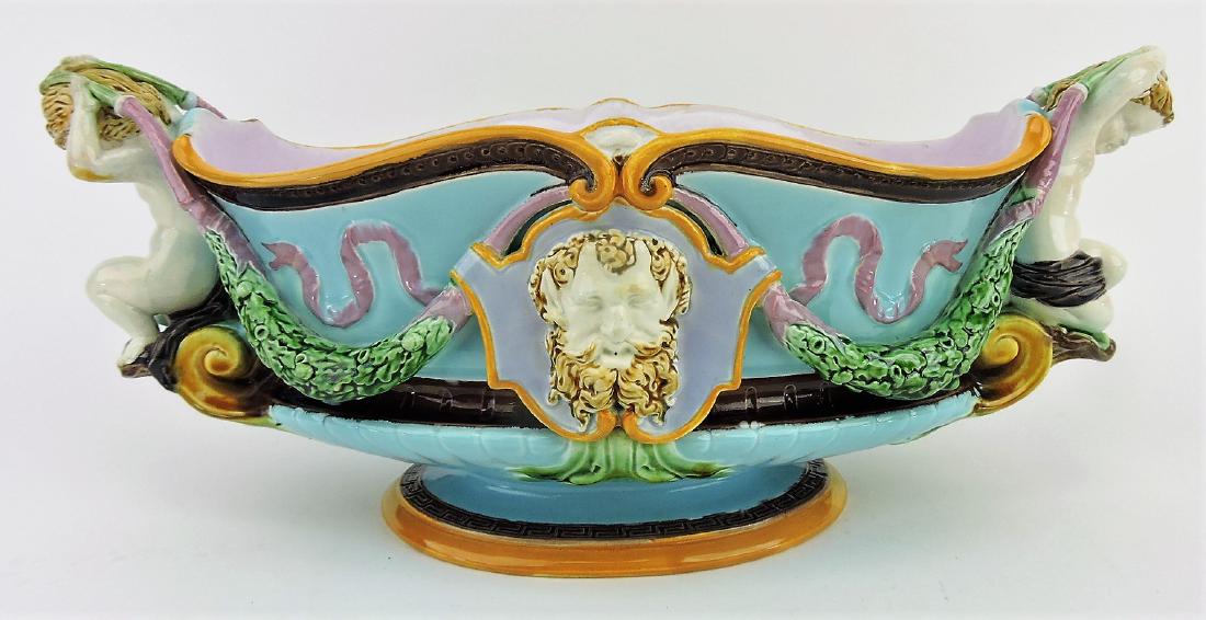 Minton majolica cherub and mask: oval centerpiece, 16"w, 7"h