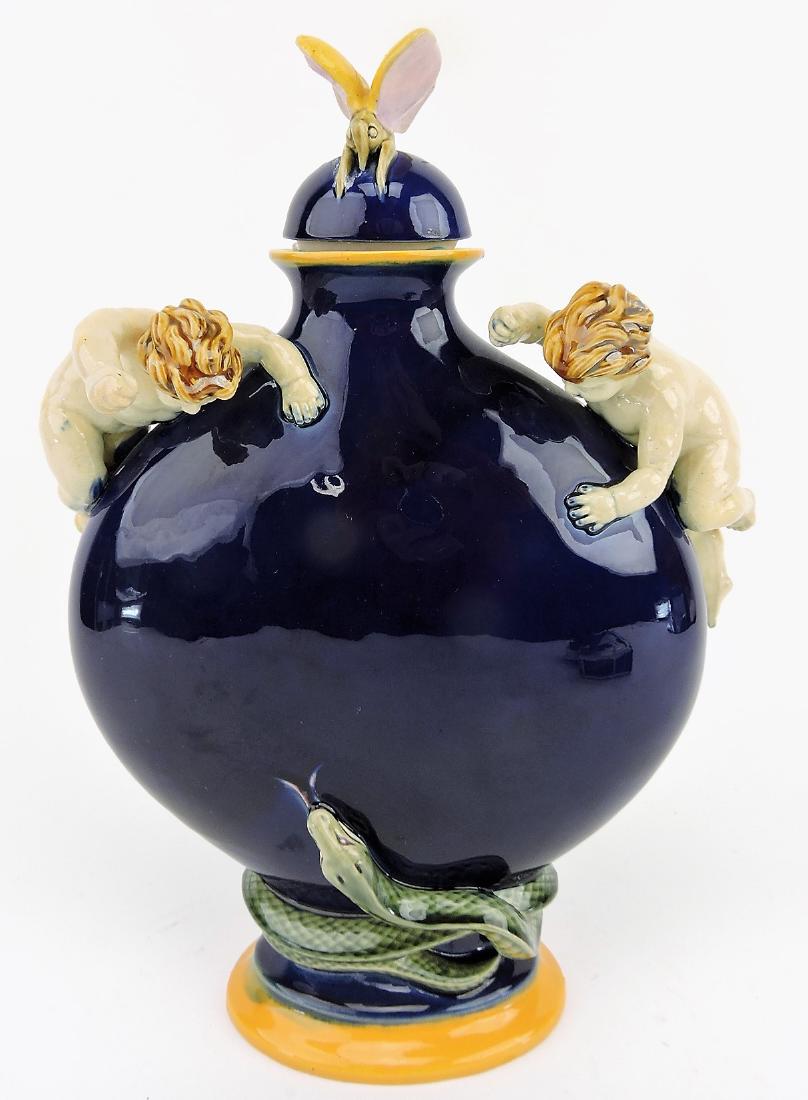 T.C. Brown Westhead Moore & Co: moon flask with two putti and butterfly finial, 12 1/2", professional repair to butterfly wings