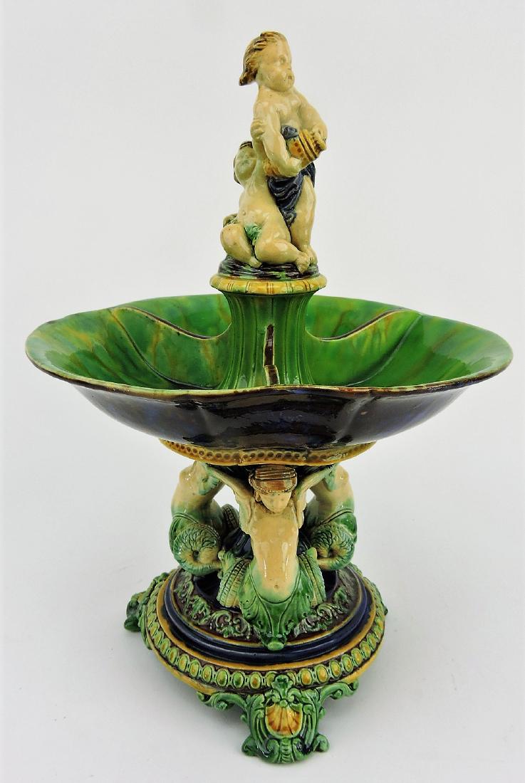 Minton majolica three part server: supported by three winged ladies, two putto for finial, professional rim repair, 12 1/2"