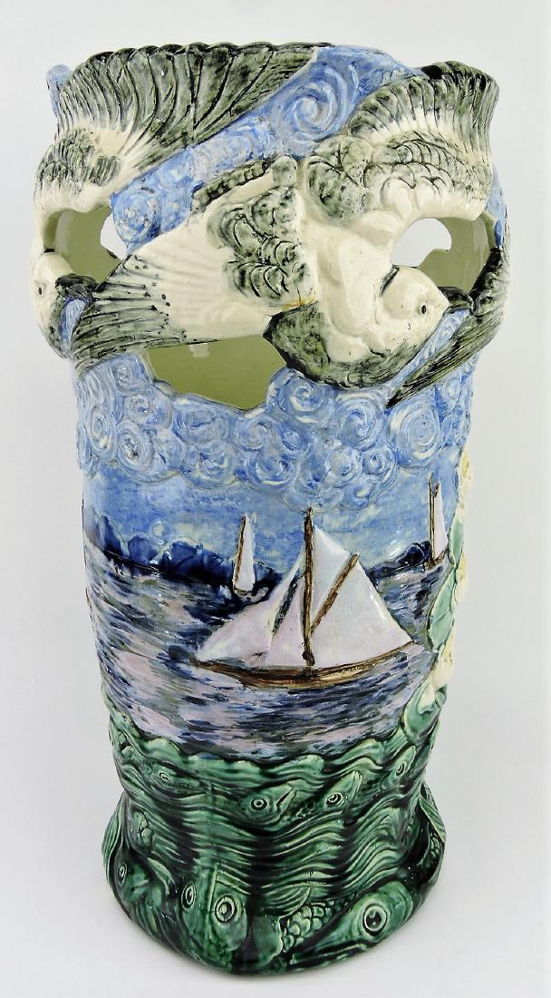 Majolica unusual umbrella stand: with seagulls in flight surrounding top, center with sailboats on water and water lilies, base surrounded by fish, 22"