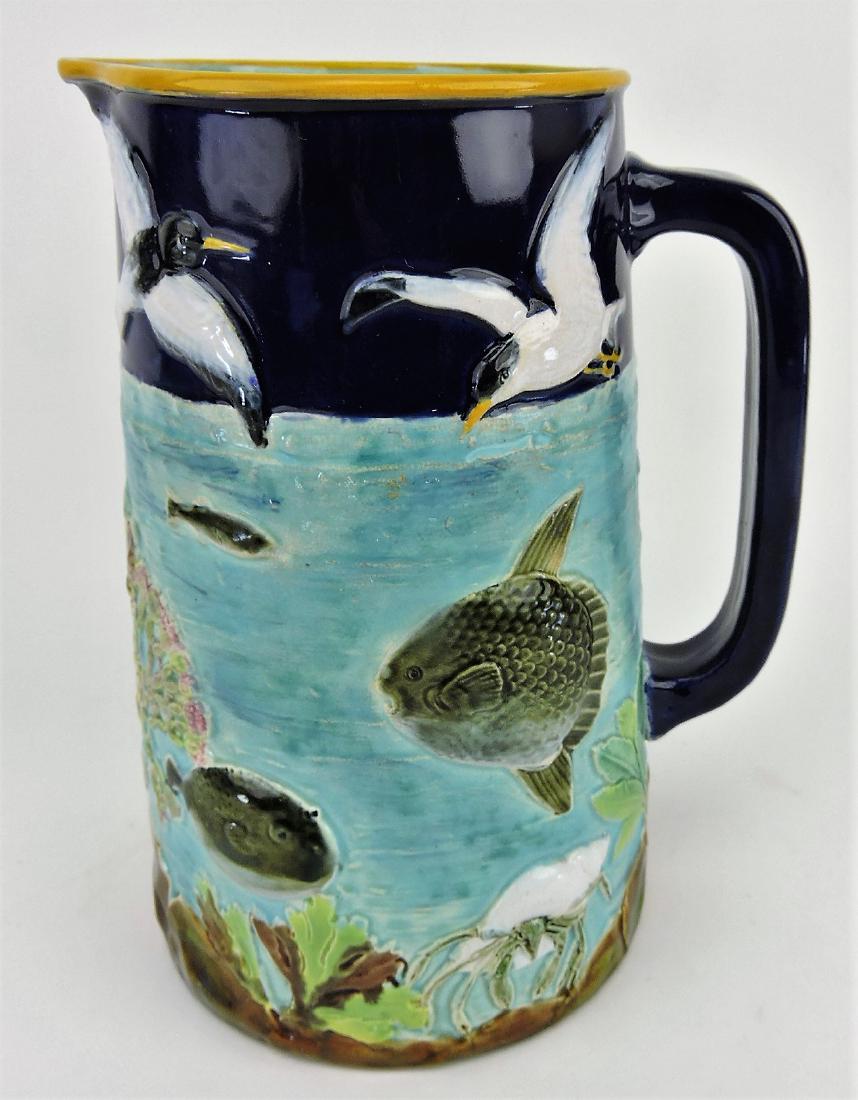 George Jones majolica rare: underwater pitcher, cobalt top surrounded by seagulls, center of turquoise water with fish, crabs, and other sealife, 9", professional hairline repair