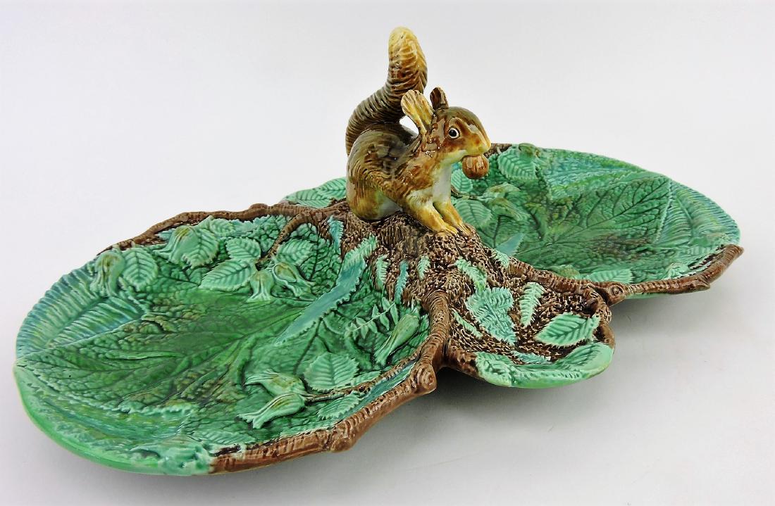 George Jones majolica two part: server with leaves, ferns, and squirrel serving as handle, 13 1/2", professional rim repair