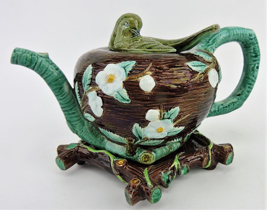 Holdcroft majolica figural teapot: with bird on nest, branch handle and spout with George Jones branch trivet, 6"h, 9 1/2"w
