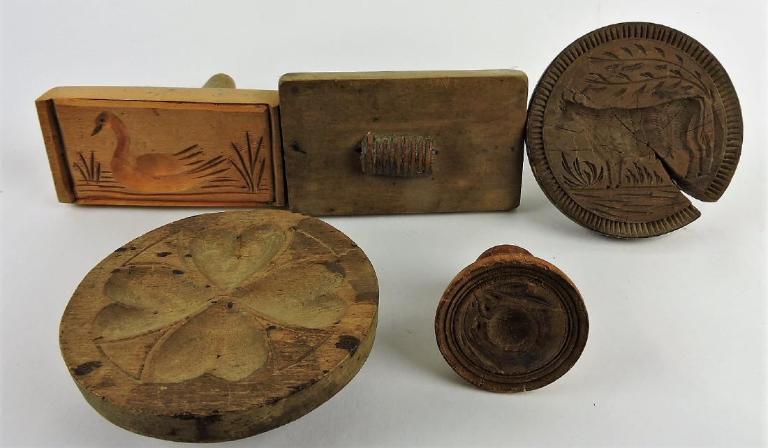 Early wooden treen lot of 5 butter: prints; swan, hearts (no handle), acorn, barrel, cow (split)