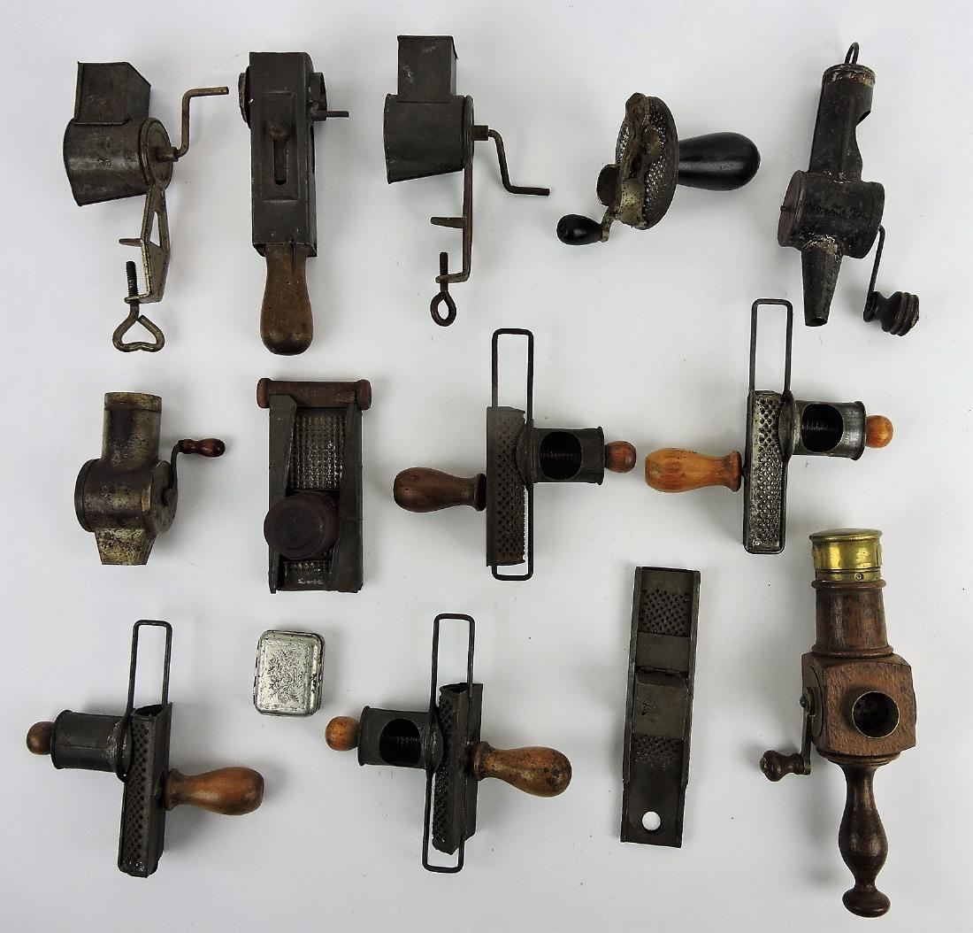 Lot of 14 early nutmeg graters: .