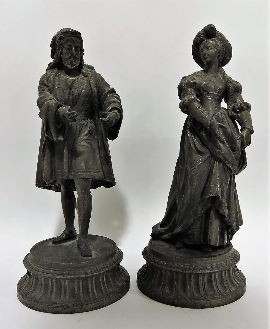 Spelter pair of figures of man and: woman, 11 1/2"