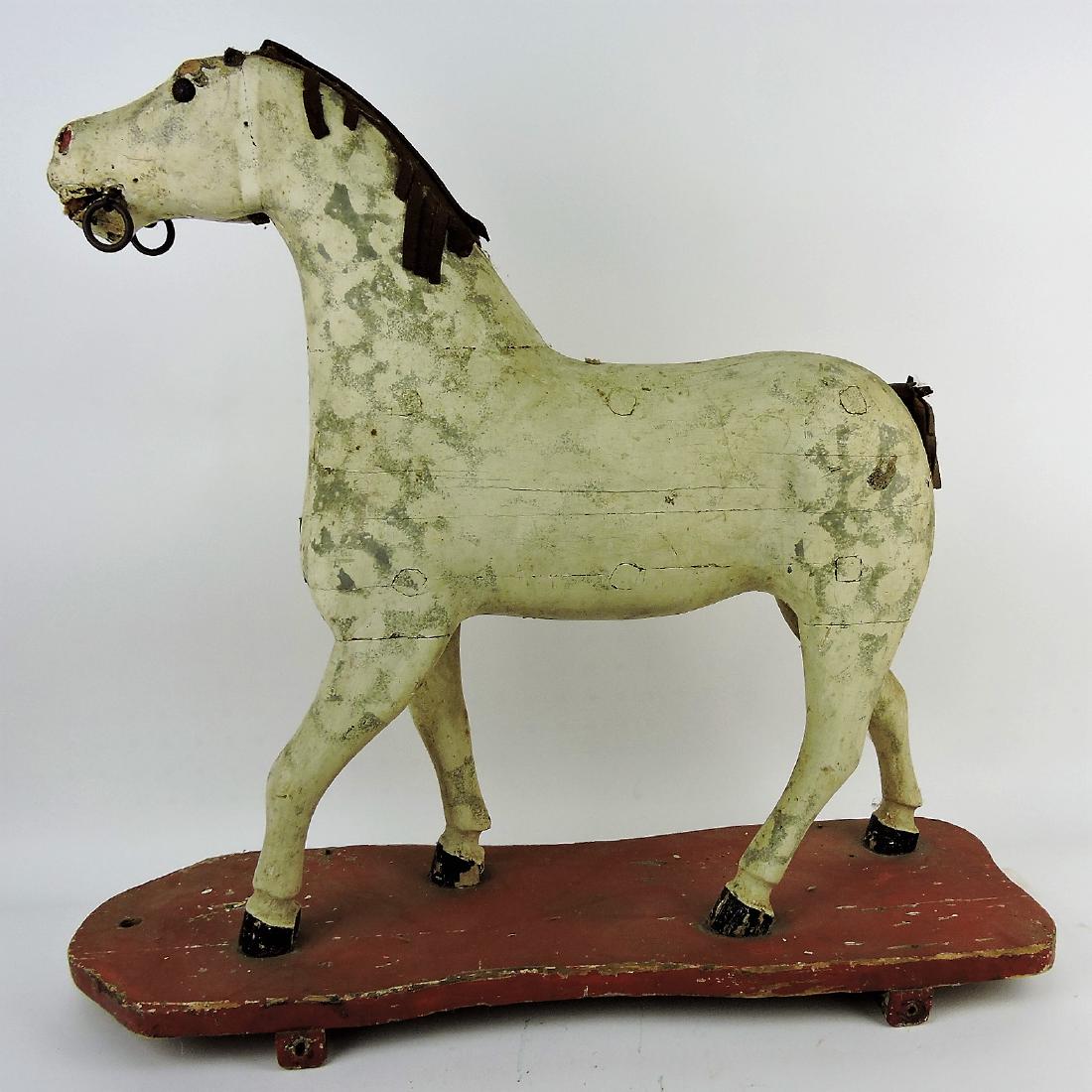Early wooden carved horse pull: toy, some losses and wear, 24"l, 22"h