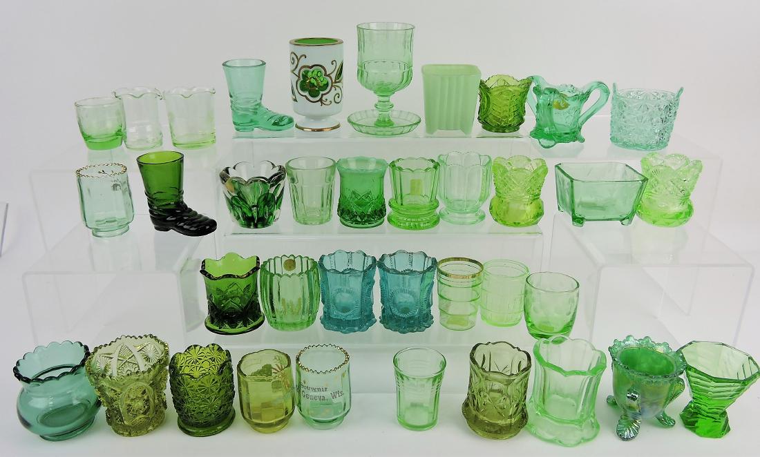 Green glass group of 37 toothpick: holders
