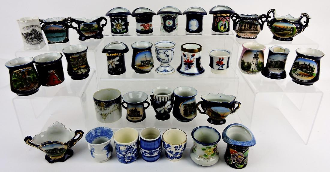 Blue porcelain group of 33 toothpick: holders, many souvenir