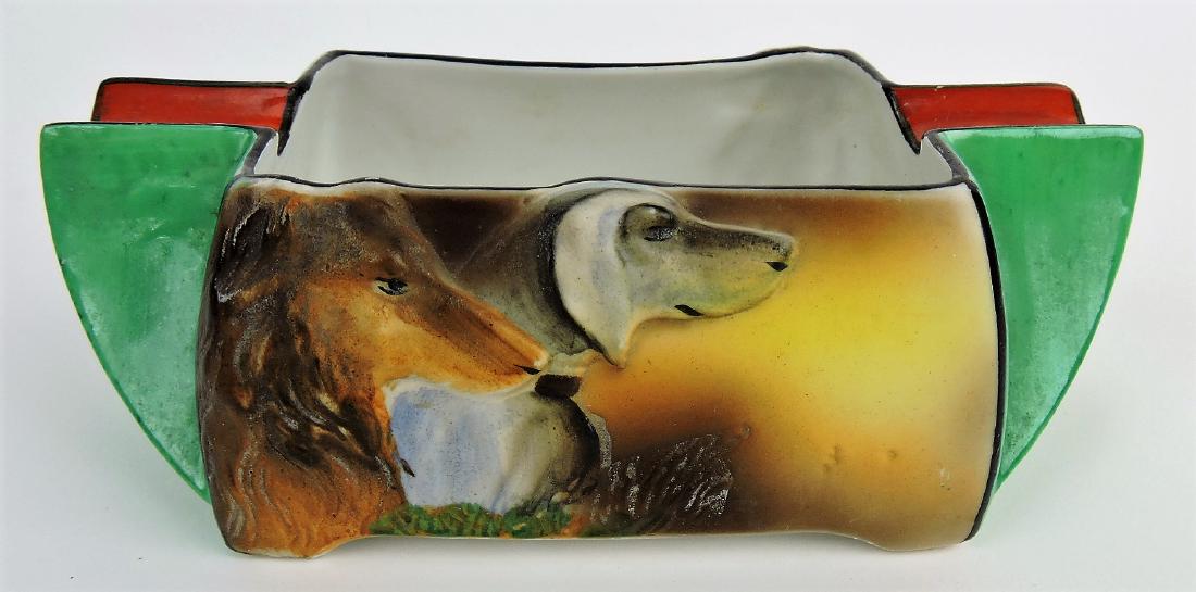 Noritake ashtray with blown out: mold of dogs