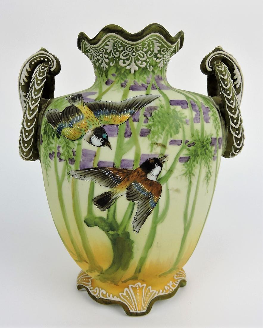 Nippon two handled vase with: birds, Moriage trim, 8"