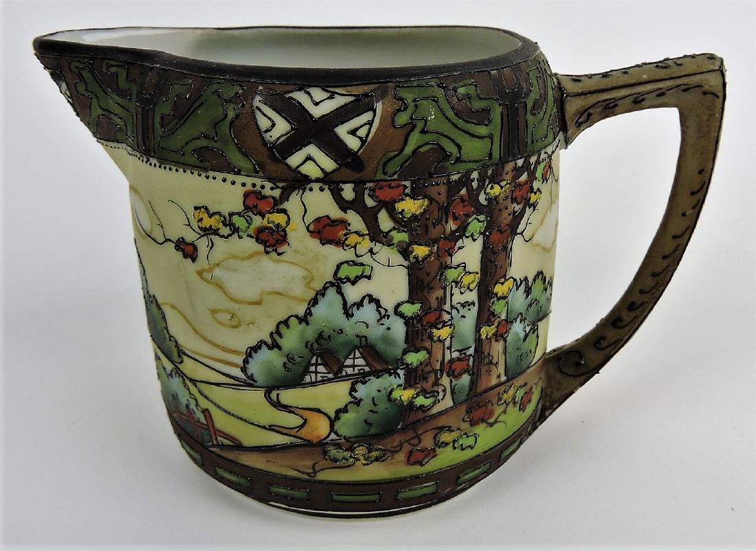 Nippon Woodland 3 1/2" pitcher: .