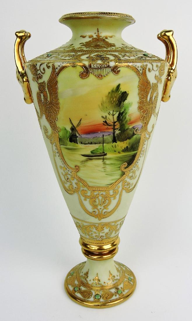 Nippon bolted two handled urn, 12",: heavy gold and jeweled enamel with scene of windmill, boat, and pond